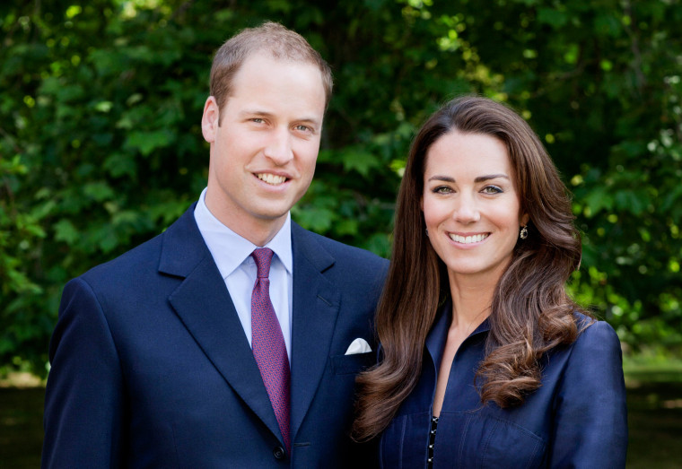Image: Britain's Prince William and Catherine, Duchess of Cambridge pose for the official tour portrait for their trip to Canada and California, in the gardens of Clarence House in London